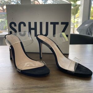 Schultz Arielle heel sandals in vinyl and black suede.